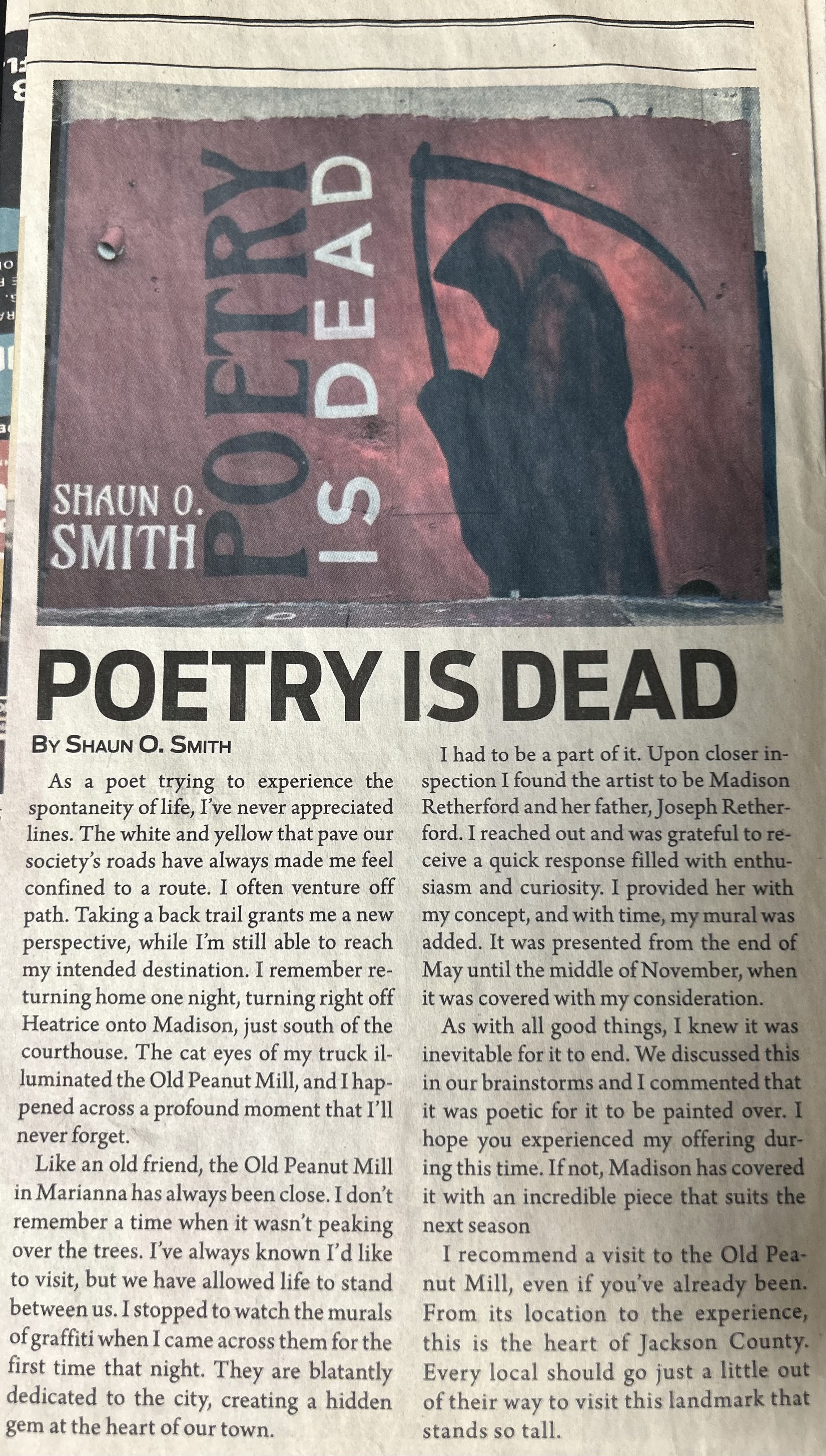 A mural of a Grim Reaper holding a scythe with the words "Poetry Dead" and "Shaun O. Smith". The mural features a dark figure against a reddish background.