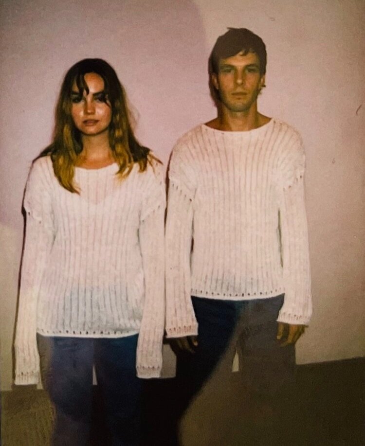 ur basics sweater on tommy and liana