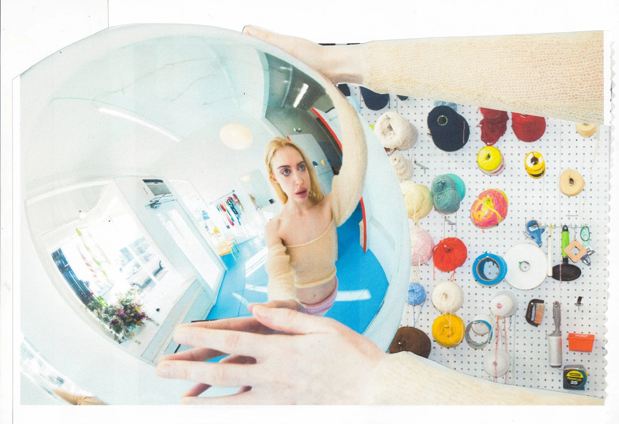 A woman with blonde hair looking into an MRI machine, with a knitting and craft supplies wall in the background.