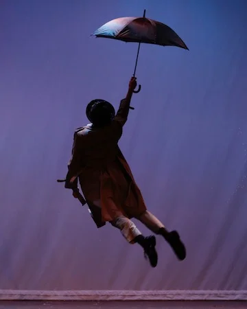 Singing in the Rain Dress Rehearsal-40 2.jpeg