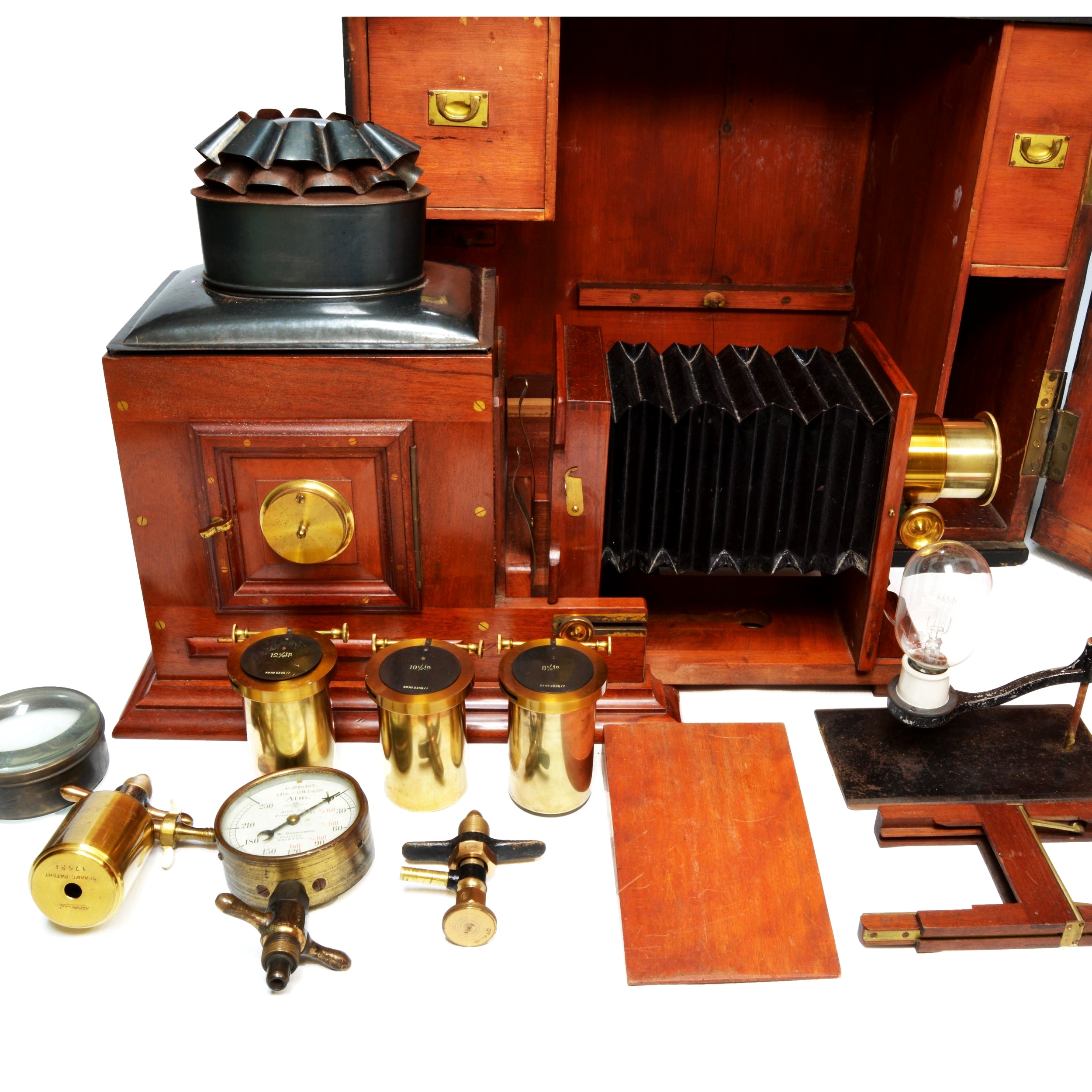 Victorian mahogany and brass magic lantern with bellows extension, fitted case