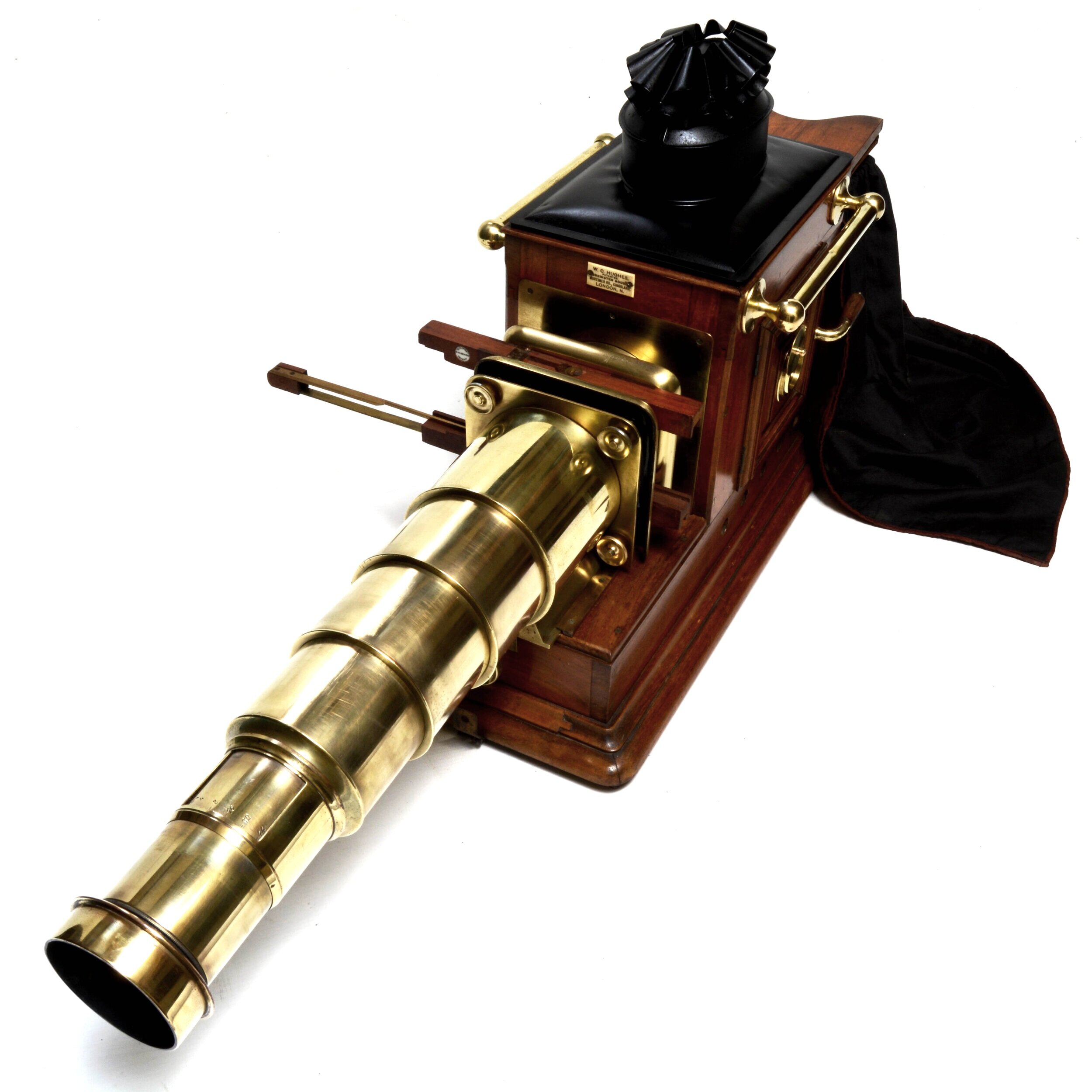 Mahogany and brass magic lantern by W C Hughes of London