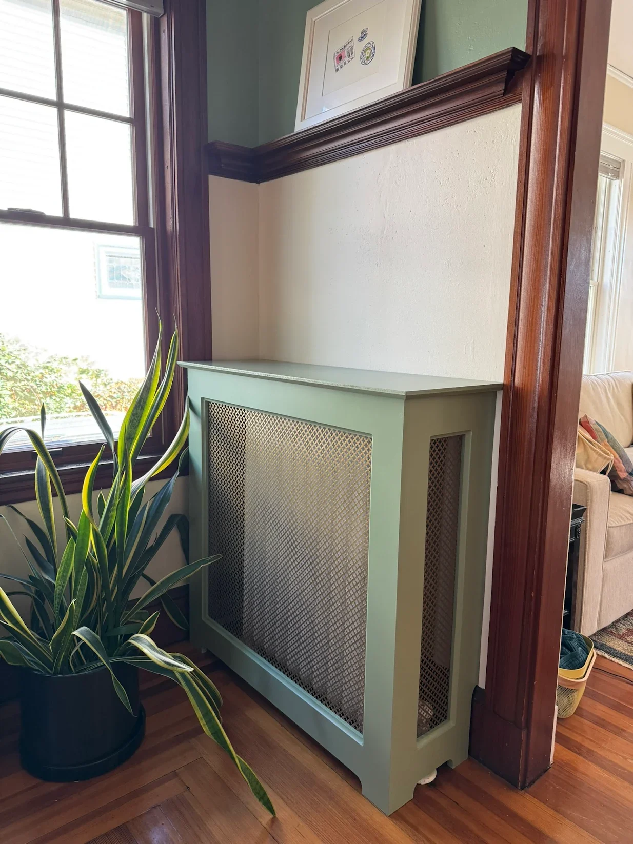 green radiator cover with brass screen.webp