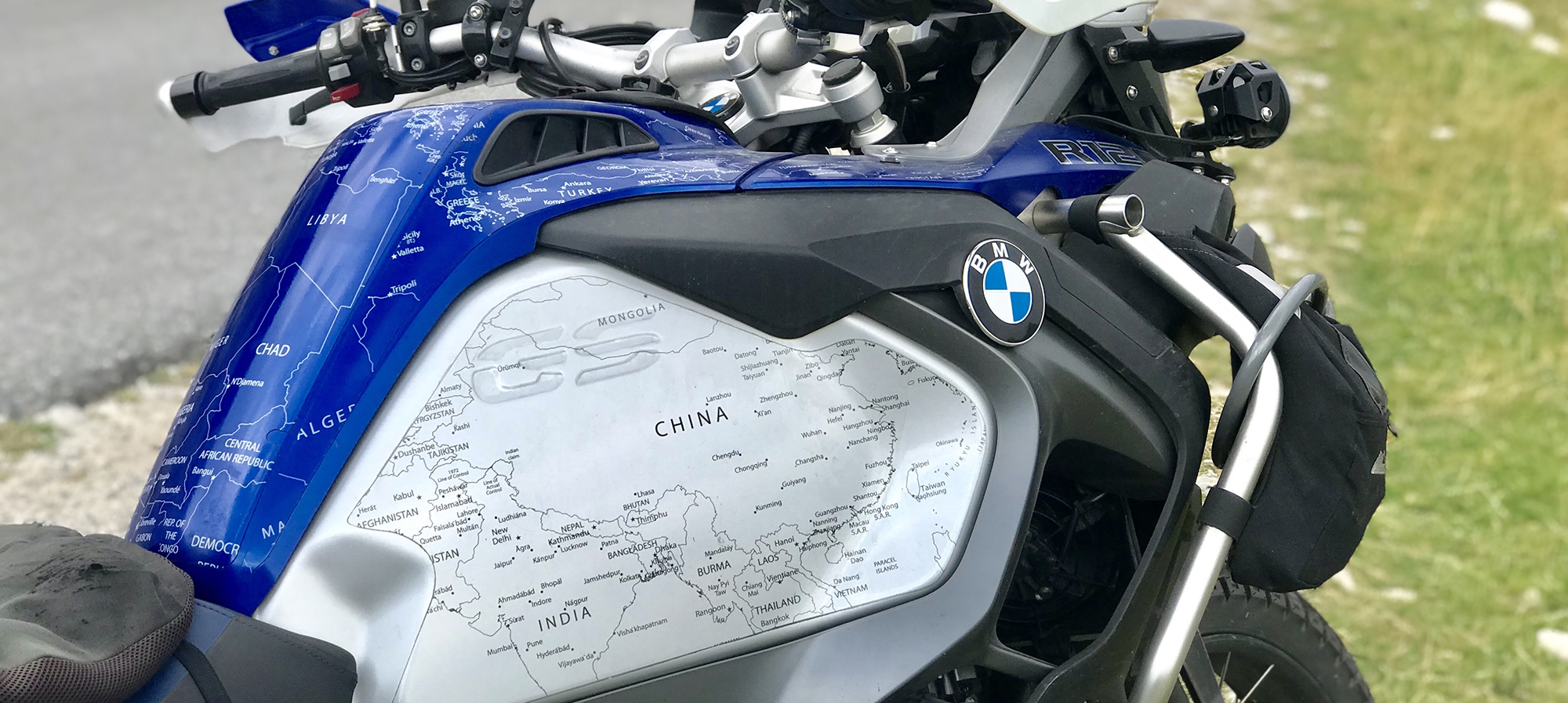 BMW R1200 1250 GS LC ADVENTURE 2014 Onwards Bmw World Stickers On A Adventure Road Side Right View Stunning Look White Map Transparent Decals On Blue And Side Tanks On Black - Header
