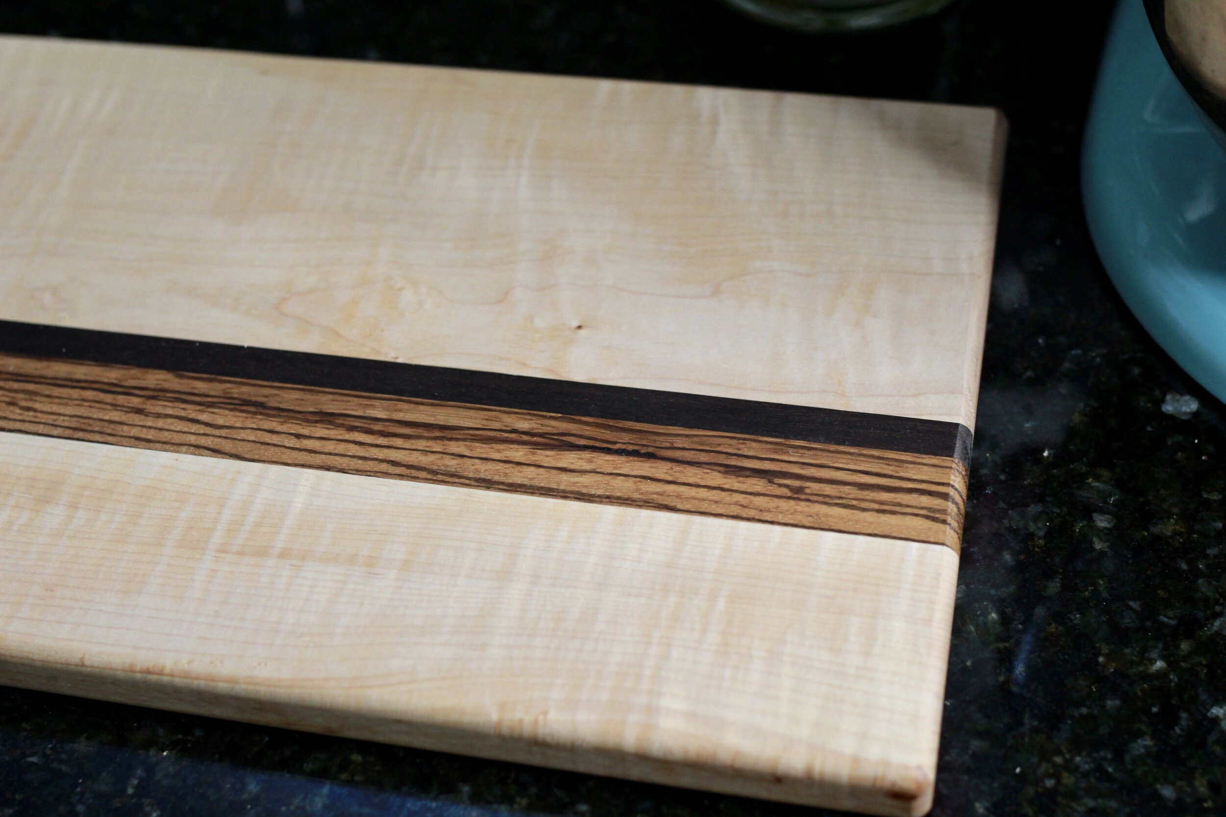 Handmade Curly Maple Cutting Board with Accent Strip