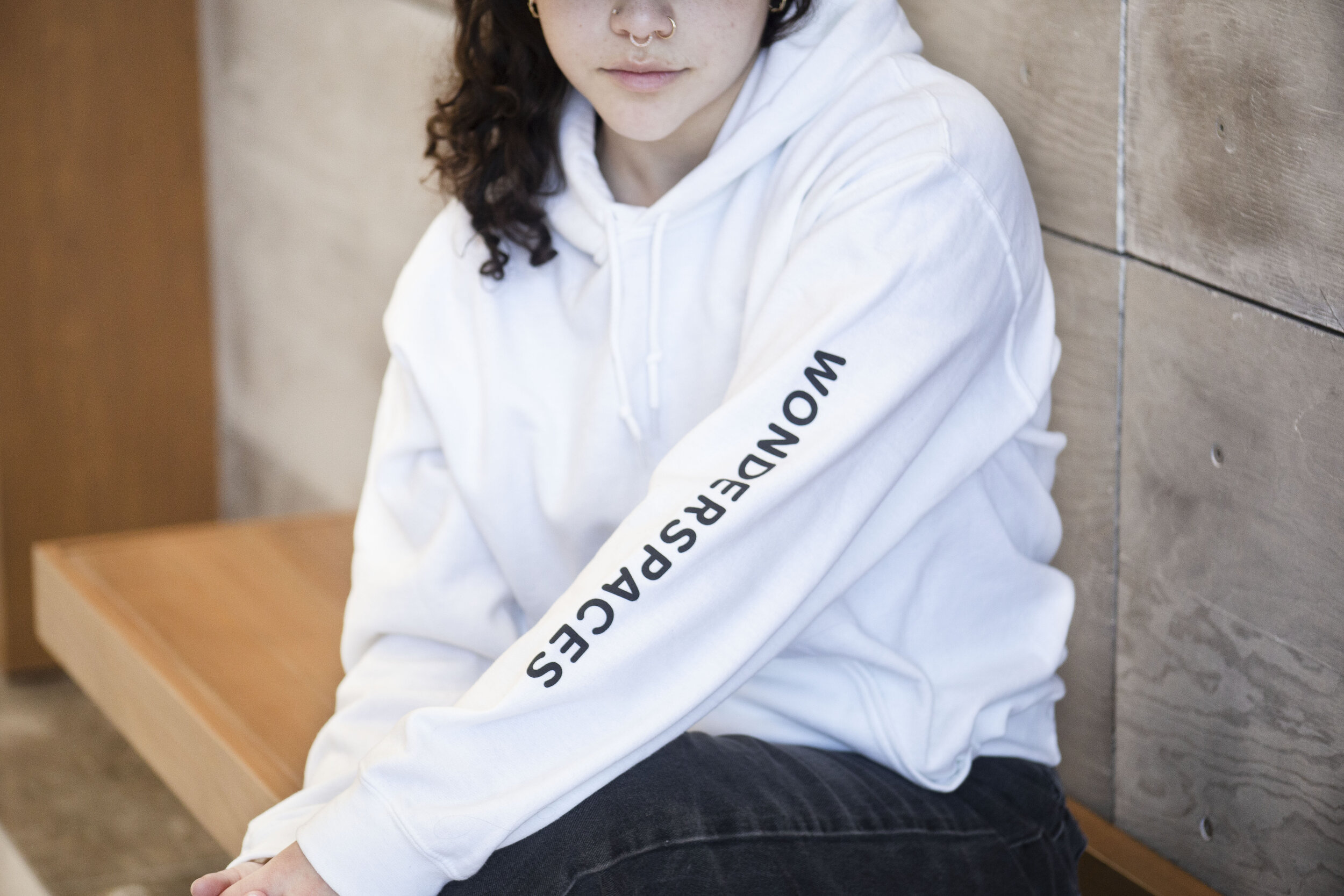 White hooded sweatshirt (S, M, L, XL, XXL) $40Photo by Yadira Villarreal