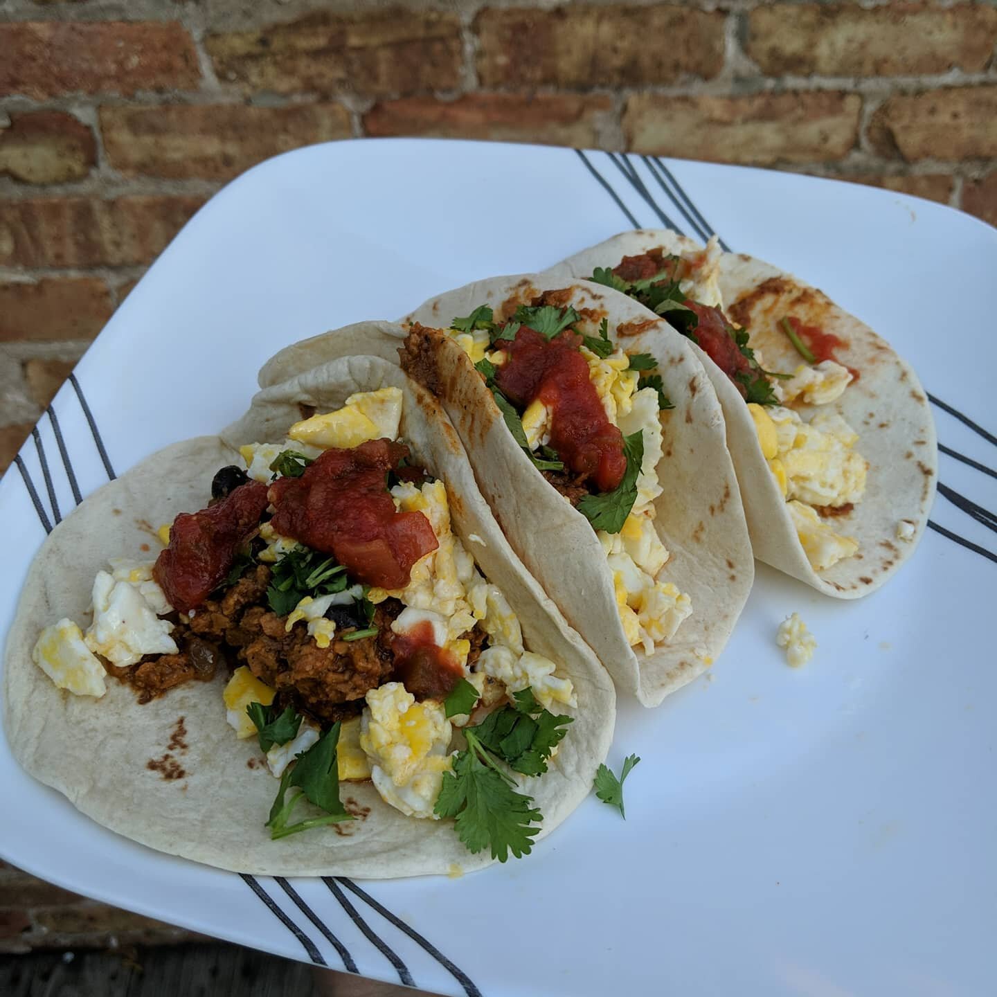 After a long day of riding my bike, it's so tempting to just want to eat junk food or order carry out! But I found myself feeling so much better if I make simple, easy meals.

Tonight I made Soy Chorizo and Eggs tacos. Minimal prep and guilt free! An
