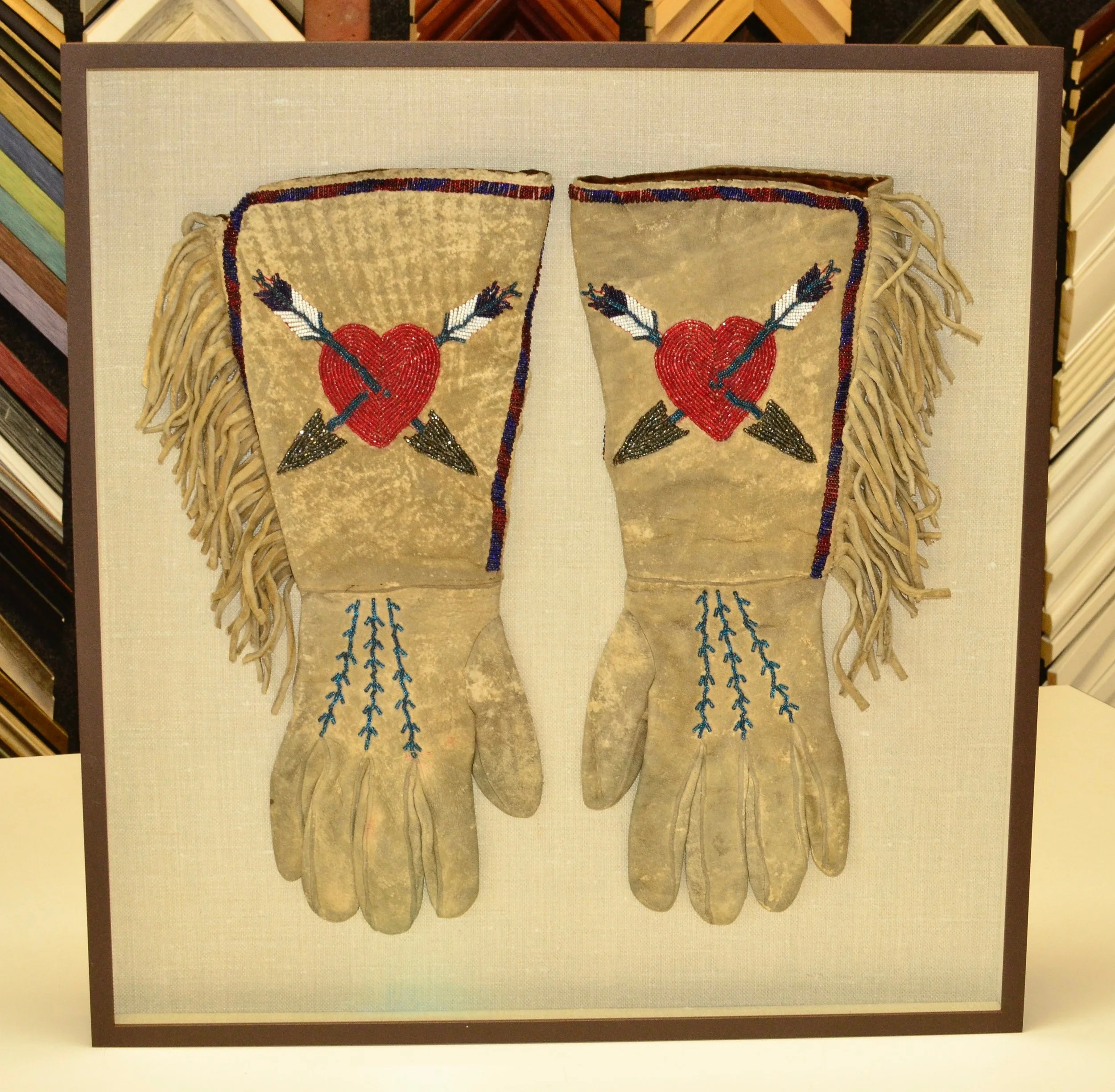 Antique hand beaded Navajo gauntlet gloves c. 1880s.