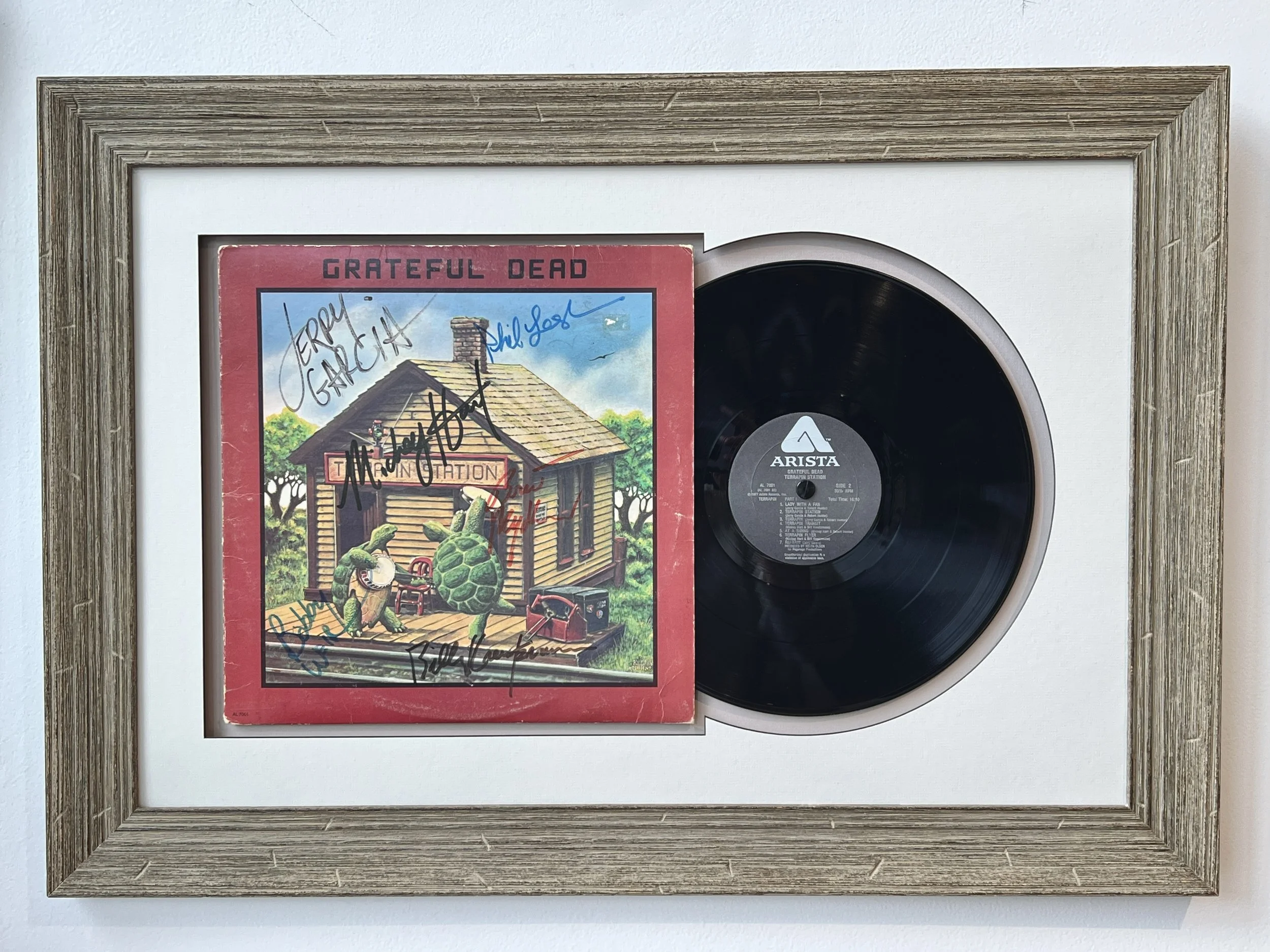 framed autographed terrapin station album lp signed by the grateful dead psychedelic band jerry graces