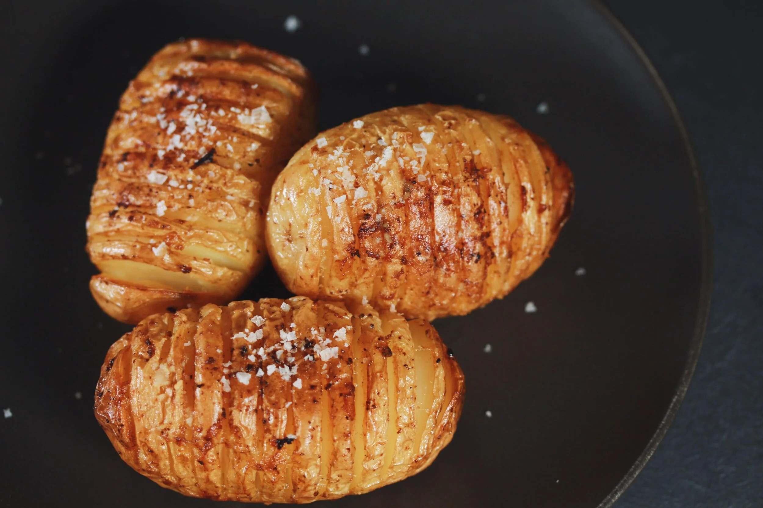CRISPY GARLIC BUTTER ROAST POTATOES