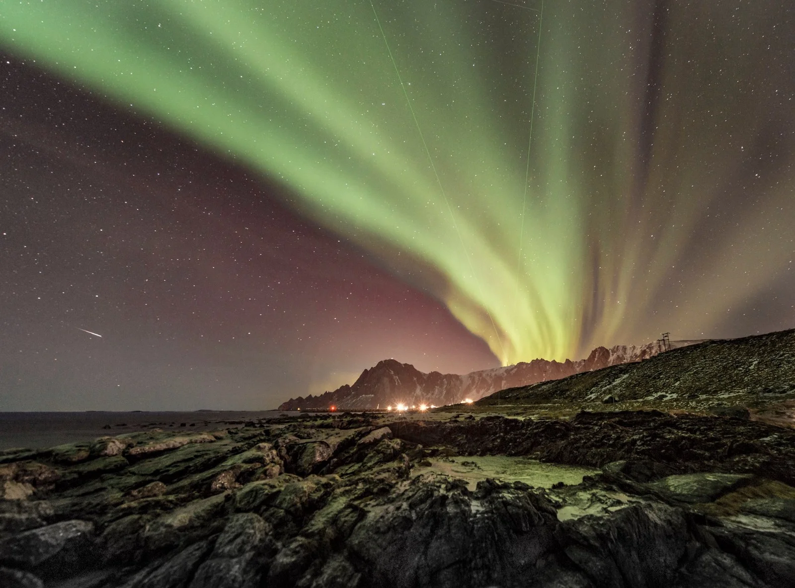 Bleik, Andøya, Norway — From the mountain you can see the two lasers from the Alomar Observatory. (Photo © Ola Albert Bjerrang)