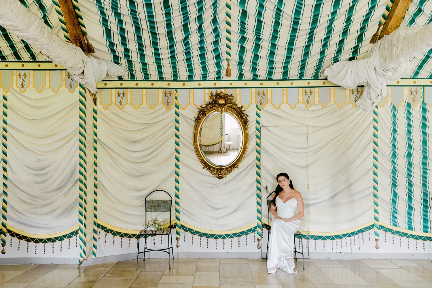 The bride in the green salon of Château de Vallery before the ceremony.