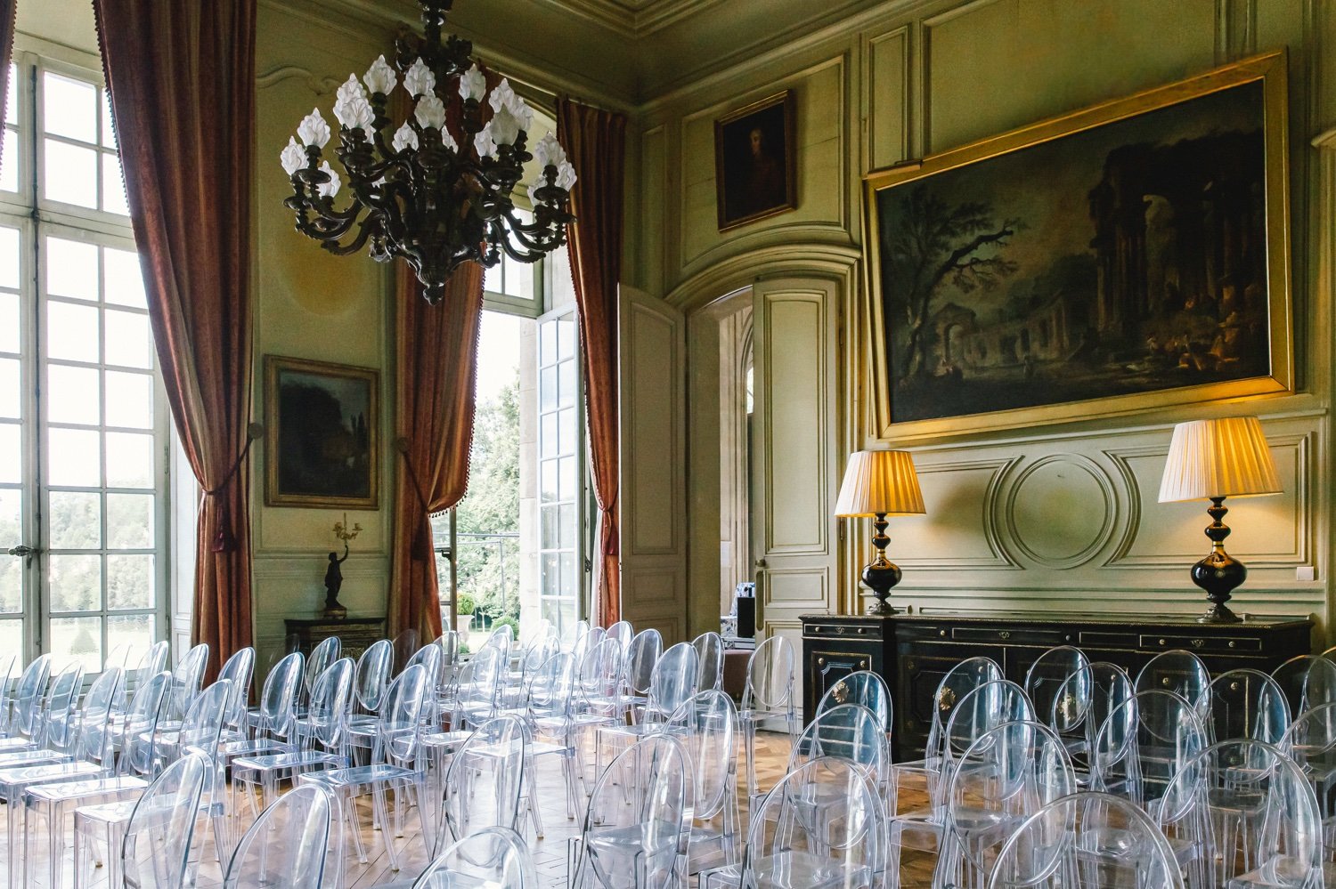 Wedding ceremony setup inside Château de Champlâtreux near Paris
