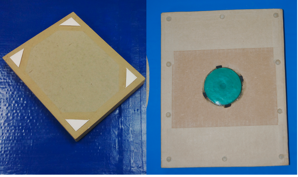  Drawing easel for a one-armed inmate, lazy Suzan embedded in the bottom.  (cardboard, lazy suzan, grippy mat) 