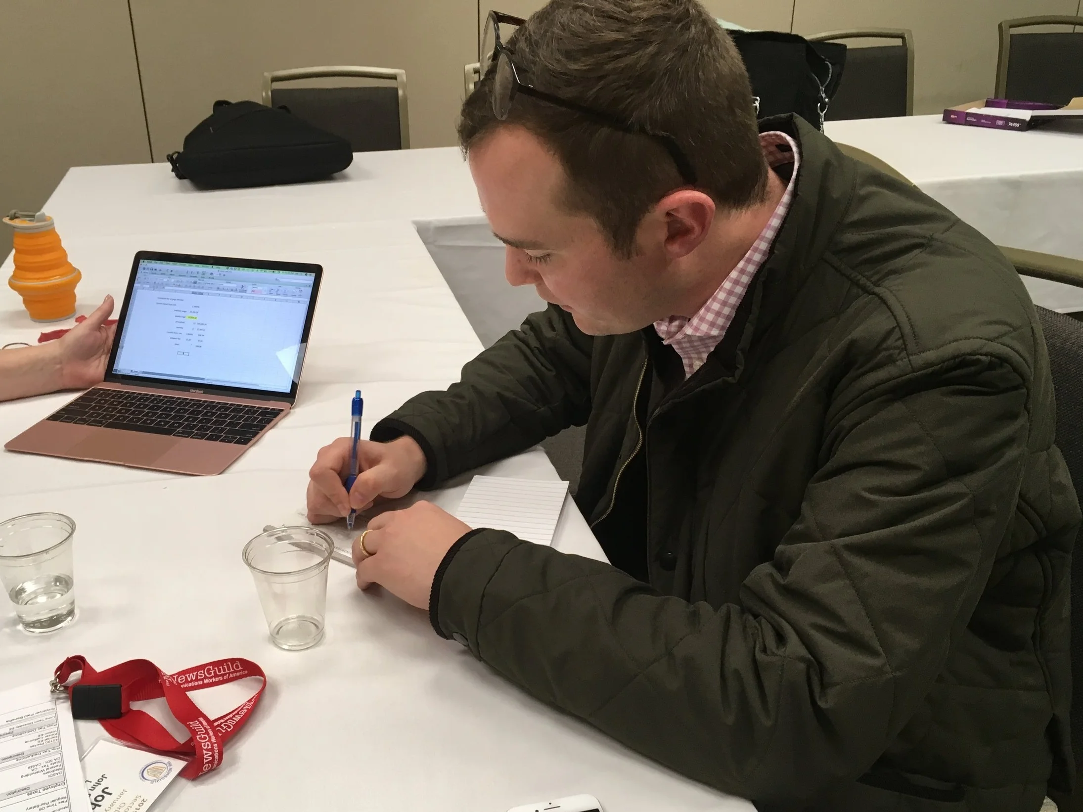 Jon writes a dues check, becoming the first Los Angeles Times journalist to pay union dues in 137 years.
