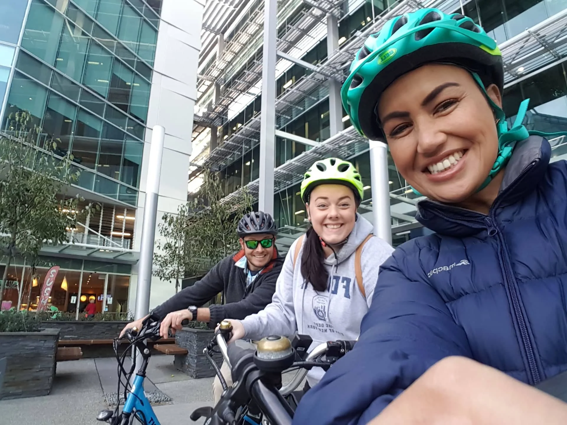 Leehane Stowers (right) and her waterfront placemaking colleagues Paul Nicoll and Charlotte Palmer, cycling through Wynyard Quarter.