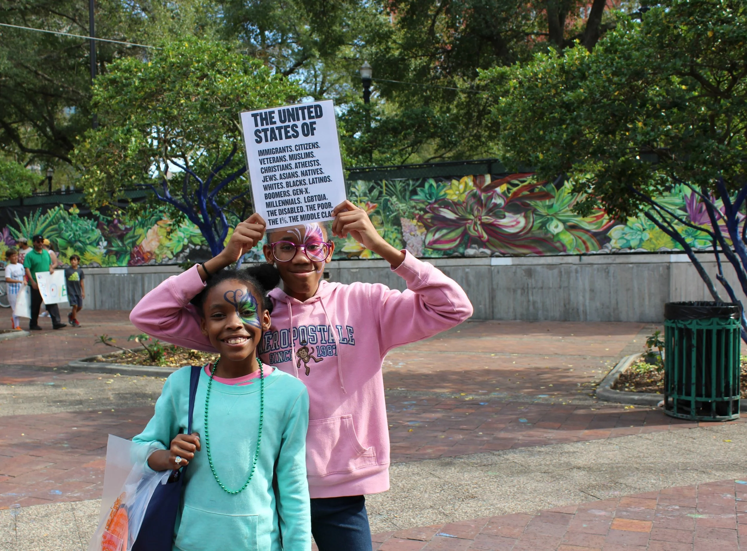 From left, Essence and Eunique Devine after the march. Their mother Erica Nelson said that it was important to her that they grow up to “have their own mind.”