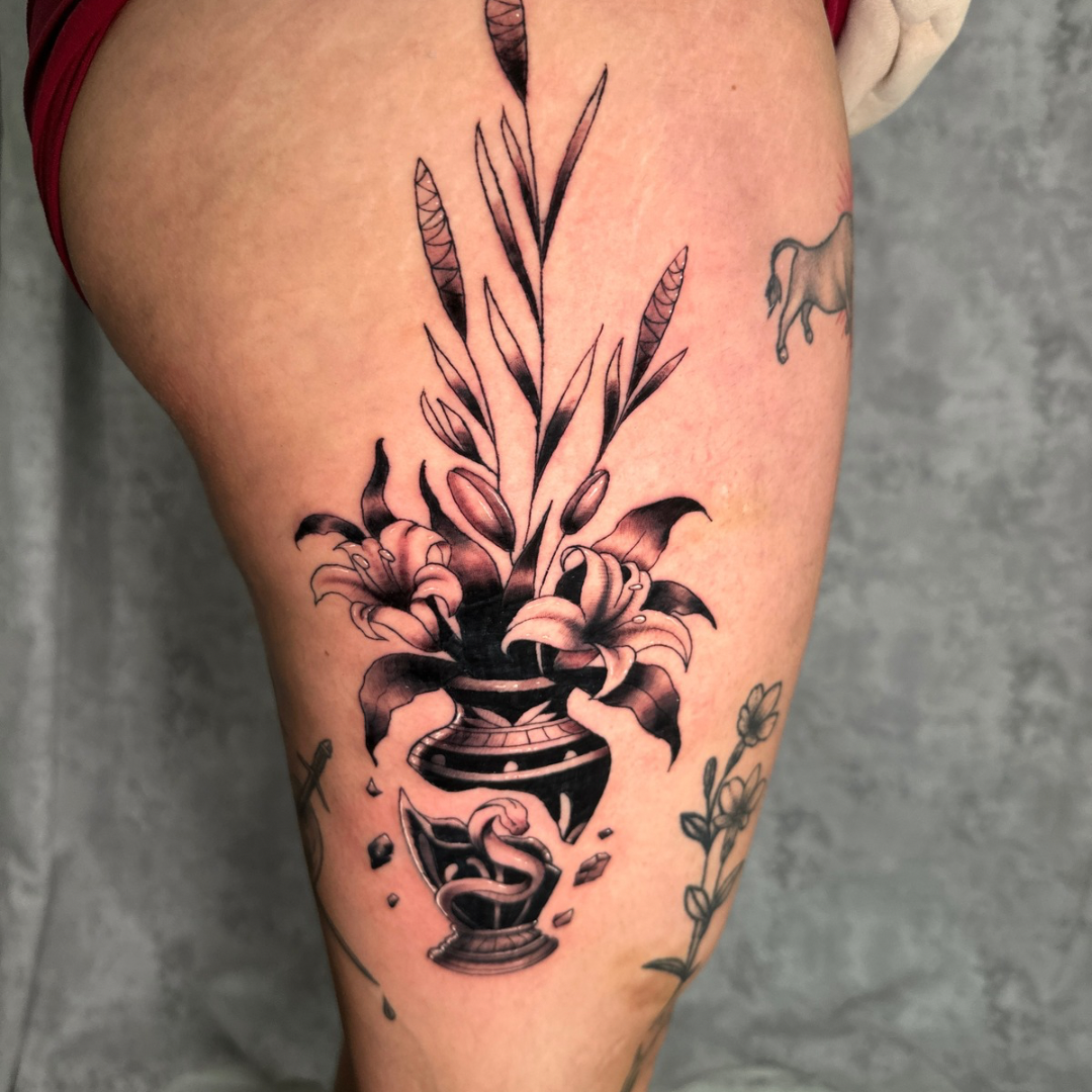 Floral Tattoo of Broken Vase