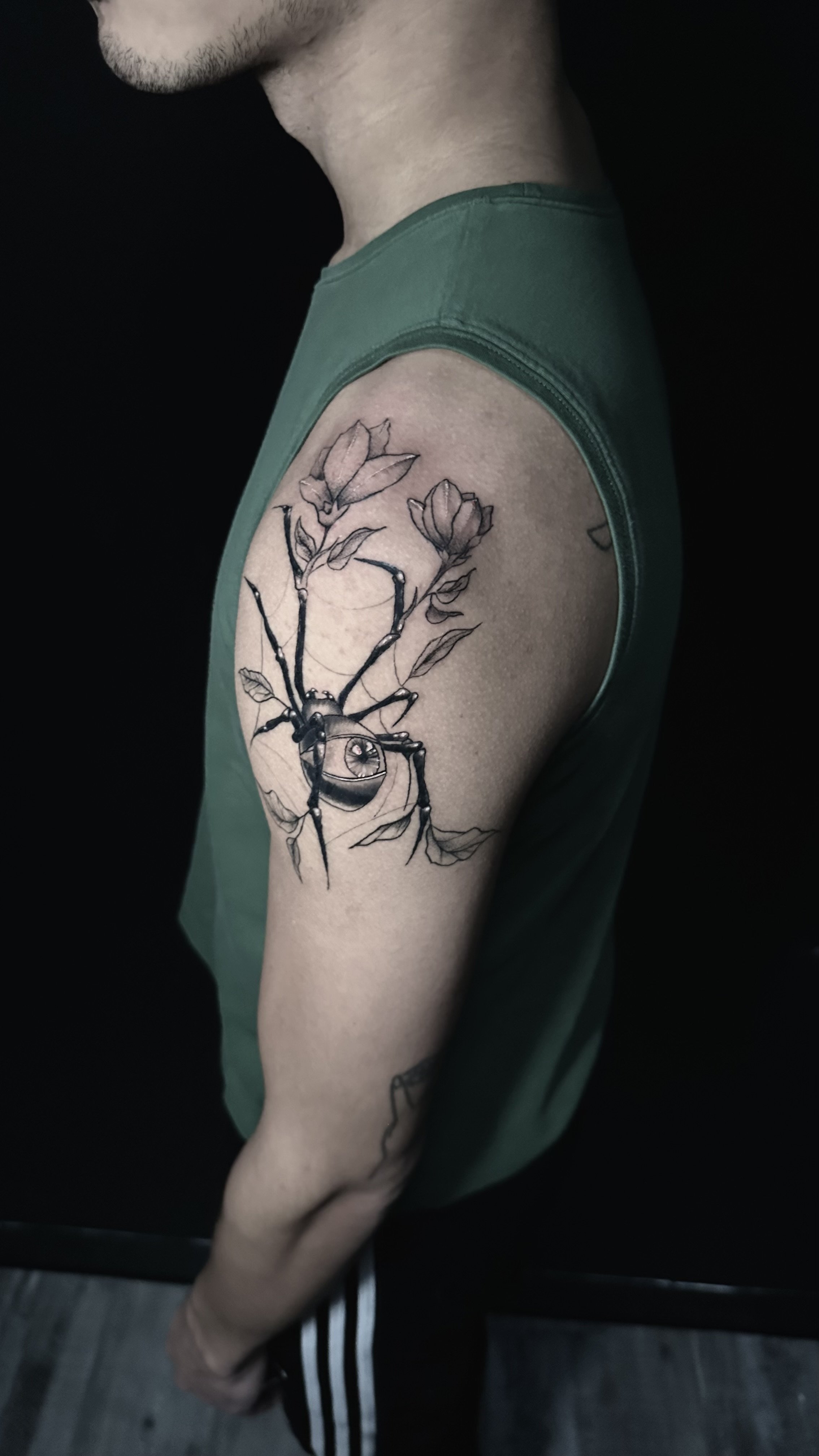 Floral Tattoo of a Spider 