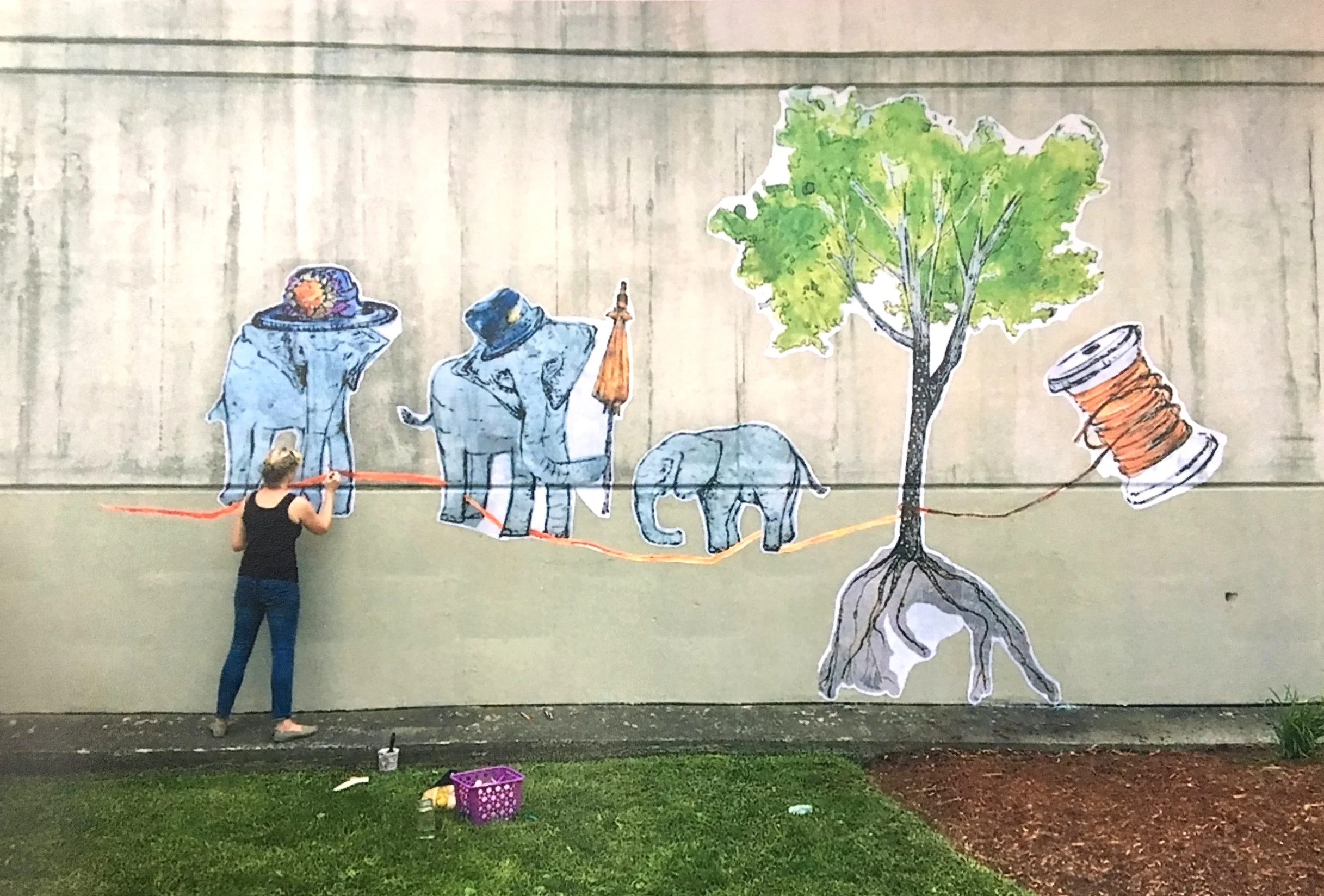 Installation of Wheat Paste Designs in Downtown Waterville