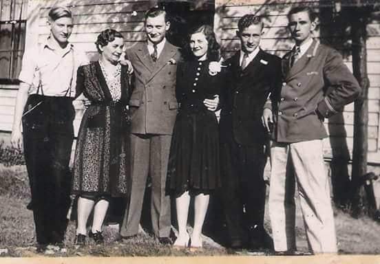  Uncle Mansfield was Best Man at our parents wedding just a few days before he left for basic training. (That's him standing on the right side of Mom – her left). Photo courtesy of Daniel L. Clegg 