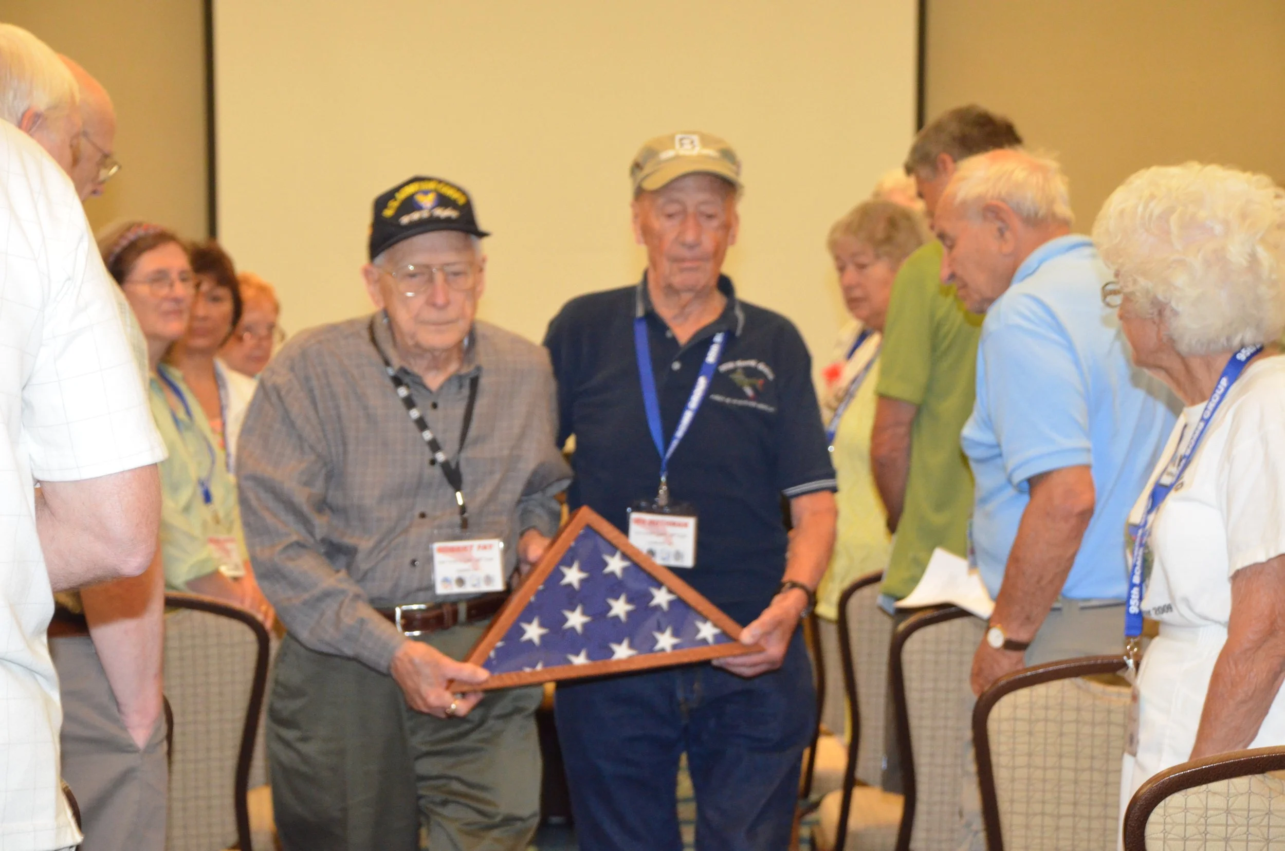 Bob Fay and Irv Rothman escort the Missing Man Flag