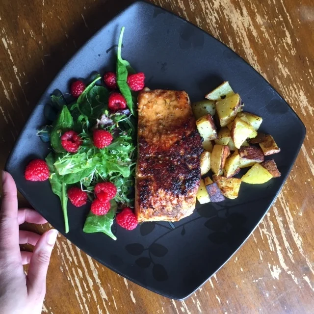 Salmon with hand.JPG