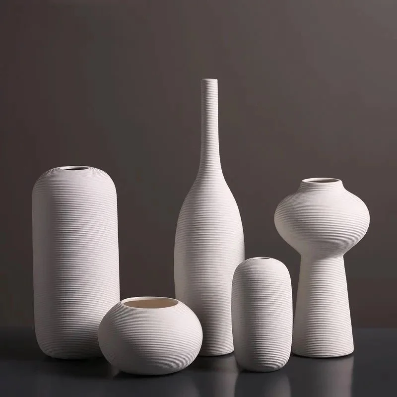 ML VASES ADDING THAT EXTRA  SPICE TO YOUR SPACE IS PERFECT WITH A VASE