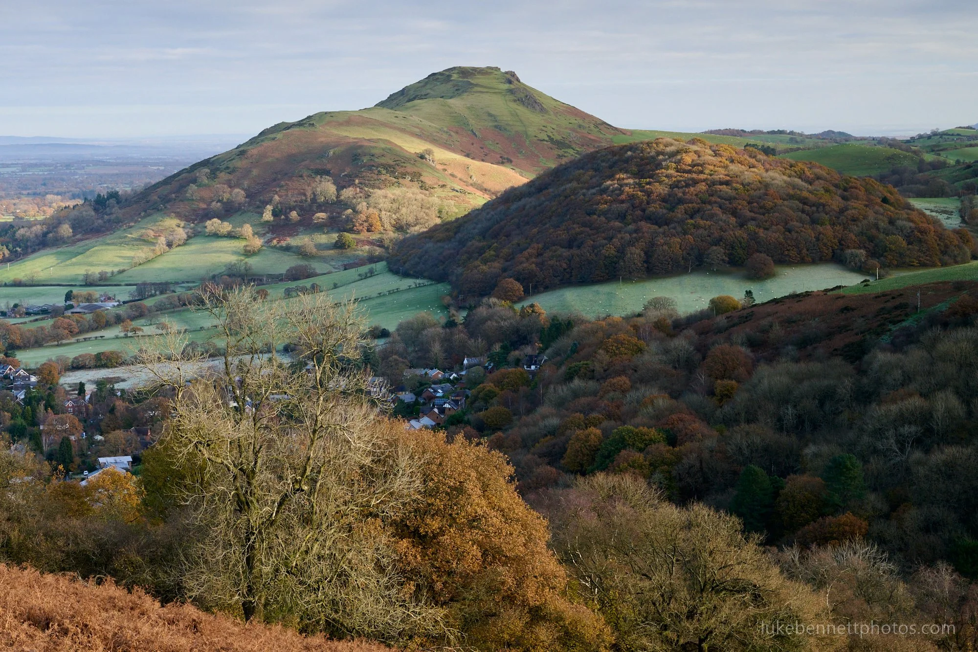  This was taken a few autumn’s back, in Shropshire. It features Caer Caradoc and Helmeth Hill, as viewed from Ragleth Hill. I remember getting up nice and early for this shot, hoping for a combination of frost and autumnal colour. 