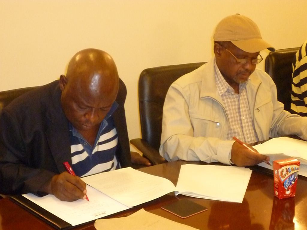 garba abba dalhatu (right) and usman adamu, both from nigeria work on the taxation of the informal sector in the developing world.