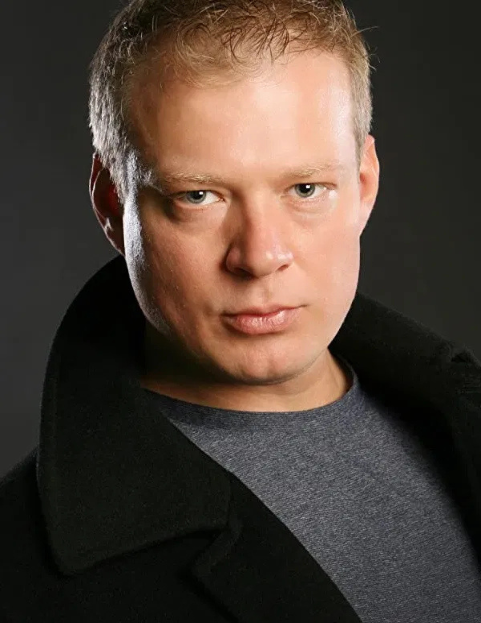 Headshot of Sasha Piltsin, film and television actor and Russian dialect coach.