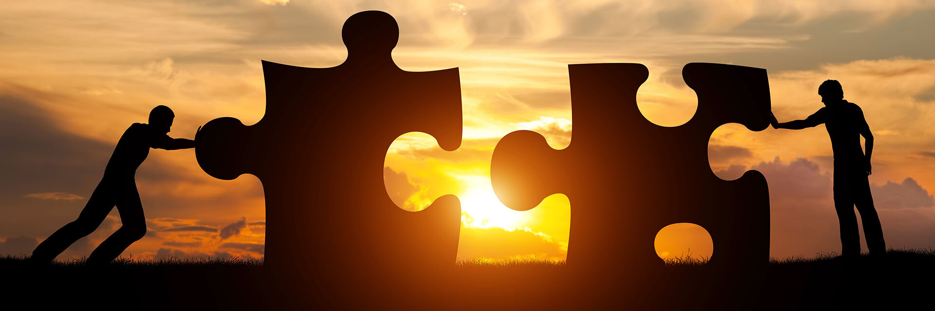 bigstock-Two-men-connect-two-puzzle-pie-127357196.jpg