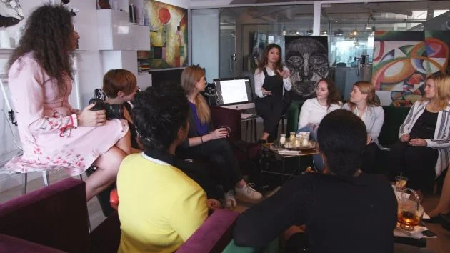 Women discuss cryptocurrency over breakfast at a meeting in Manhattan. CNBC