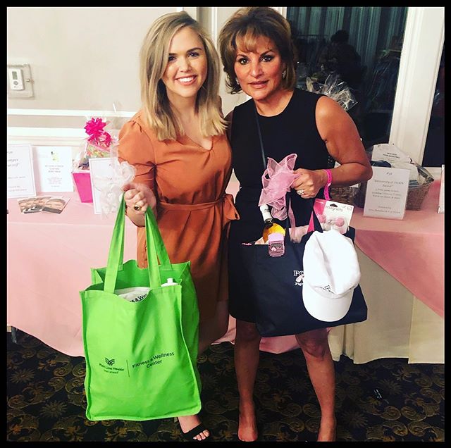 Our physician assistant Kelly and aesthetician Rima with their raffle prizes at Fashion for the Cure 💕