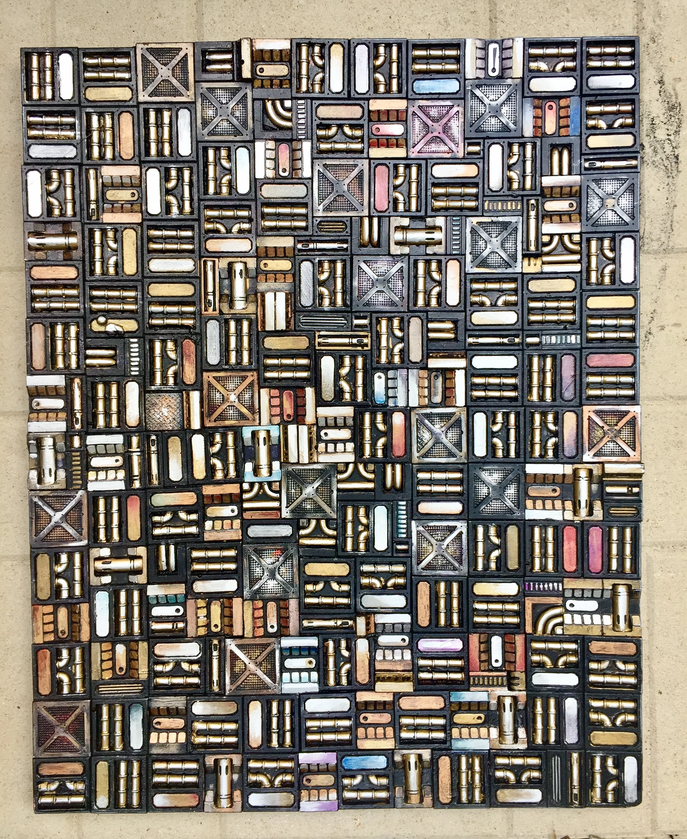 The Machine. 3D mixed media on canvas Acrylic on die stone 16” x 20” SOLD
