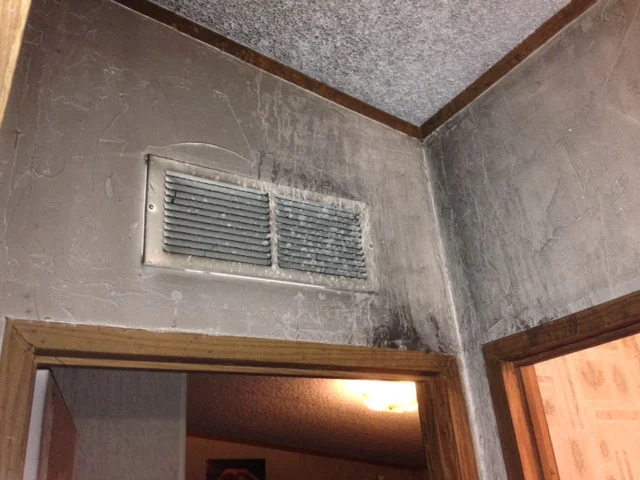 fire damage to interior walls and ceiling of home