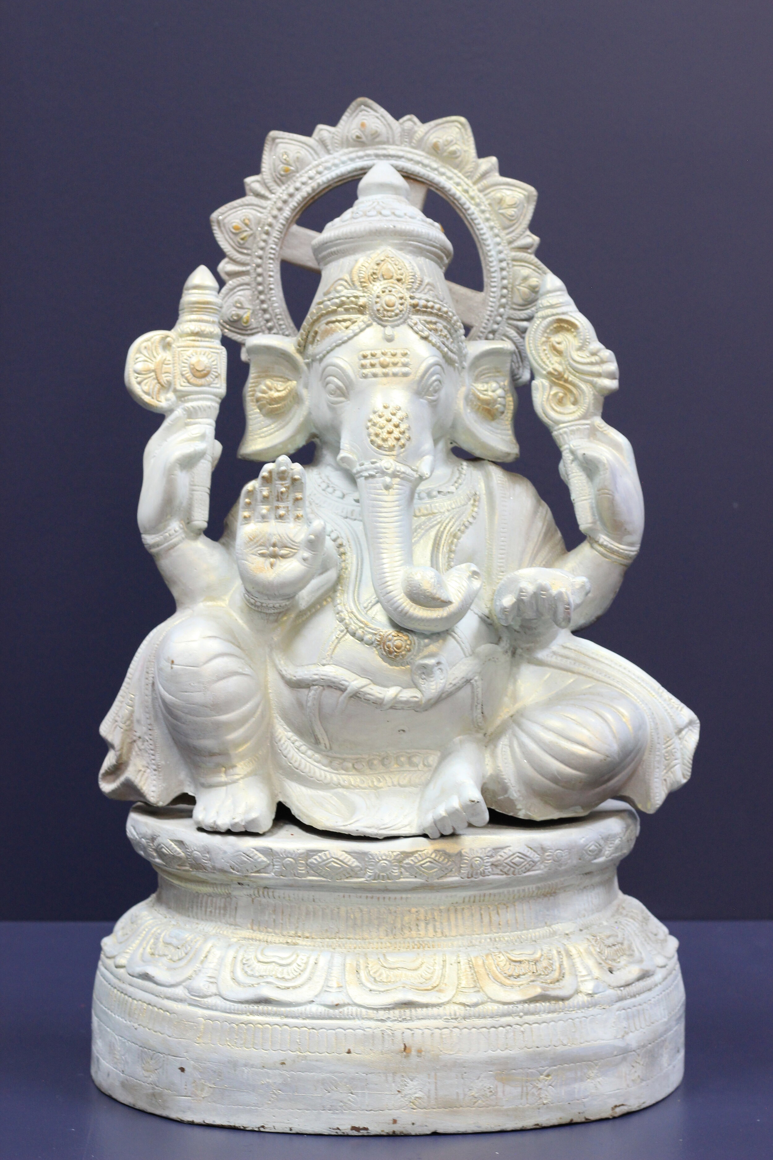 White Ganesh Statue with Gold Accents