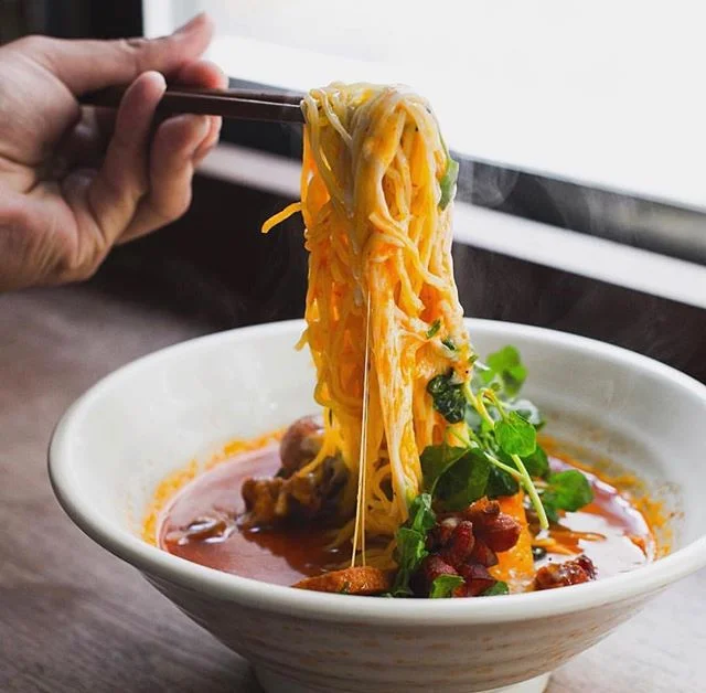 Mondays ain&rsquo;t so bad when you got a noodle pull lookin&rsquo; like this 🤤 Come warm up with a hot bowl of ramen on this cold &ldquo;spring&rdquo; day! #mokbar
