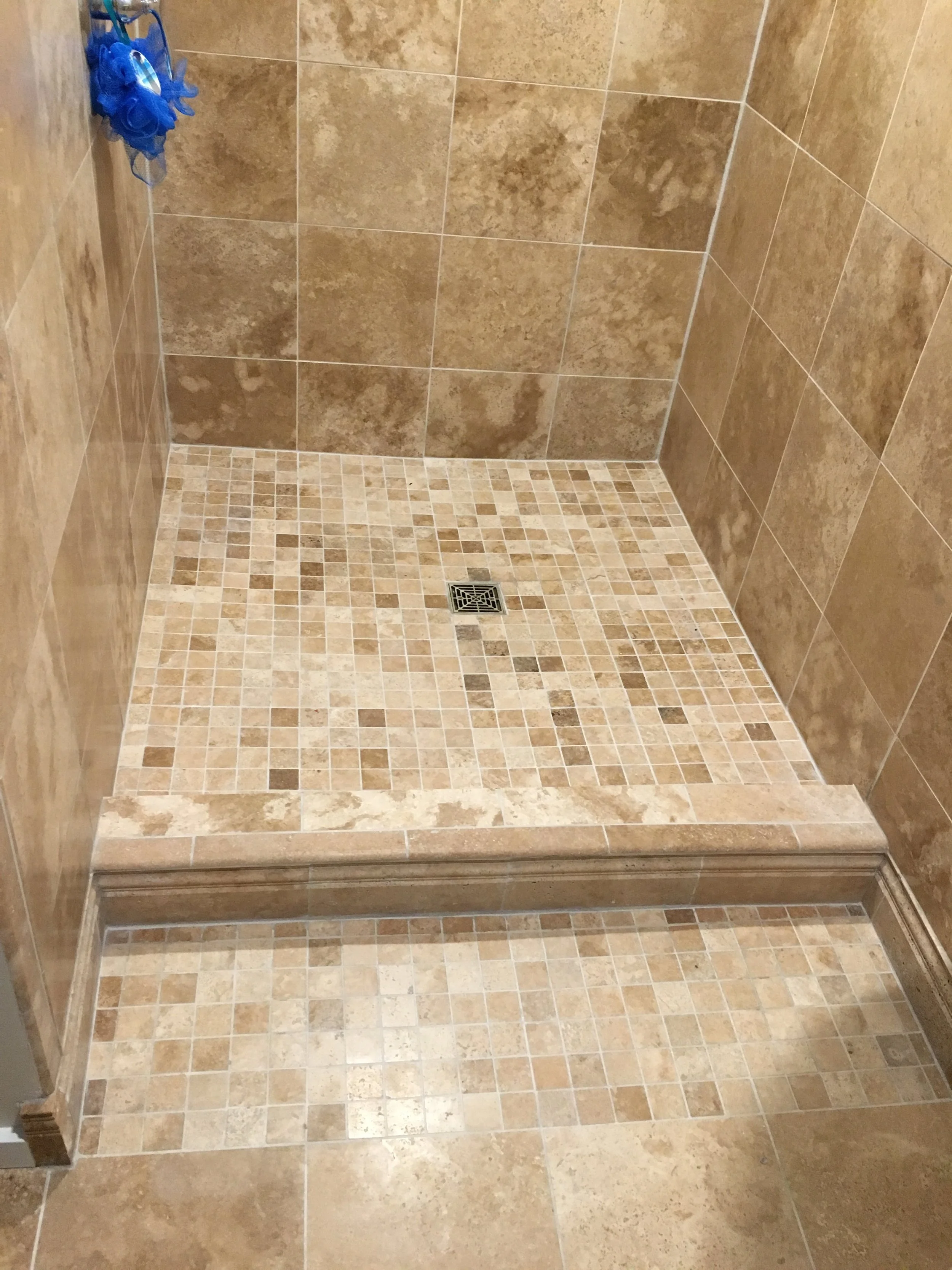  We carried the mosaic floor out shower to help with slip prevention. 
