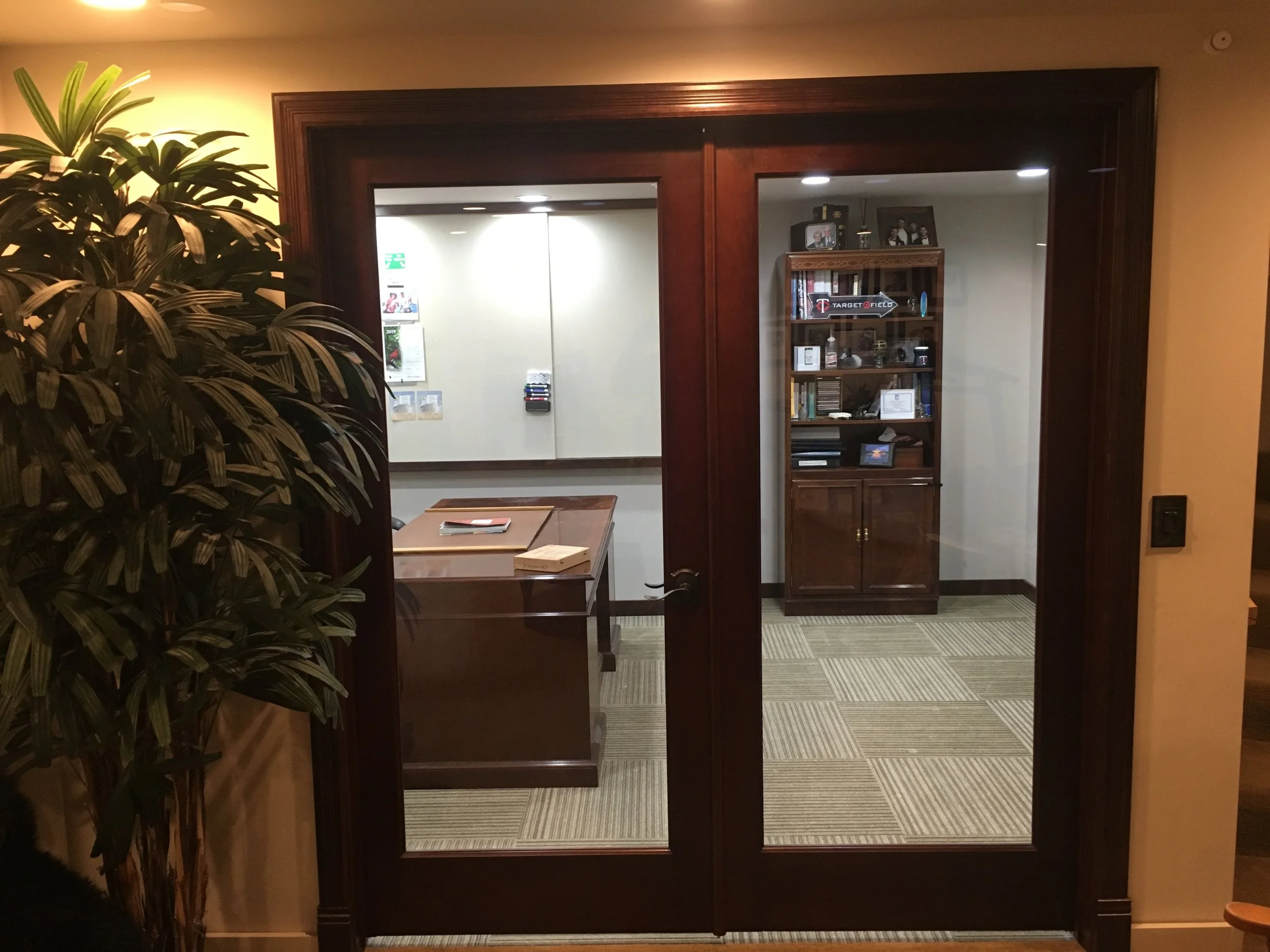  French doors open into a cozy office. 