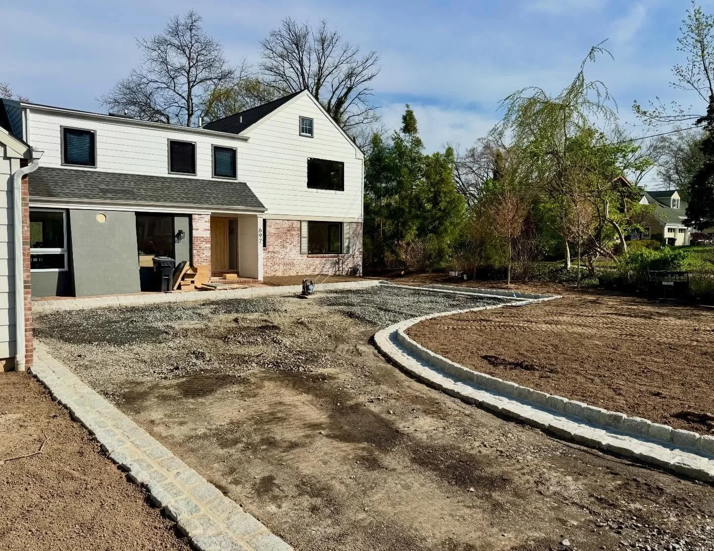 Big upgrade in the works! 🚜✨ 

We&rsquo;re installing a brand-new tar and chip driveway with beautiful Belgium block curbing and border, combining classic charm with long-lasting durability. This design adds a timeless touch while keeping the natura