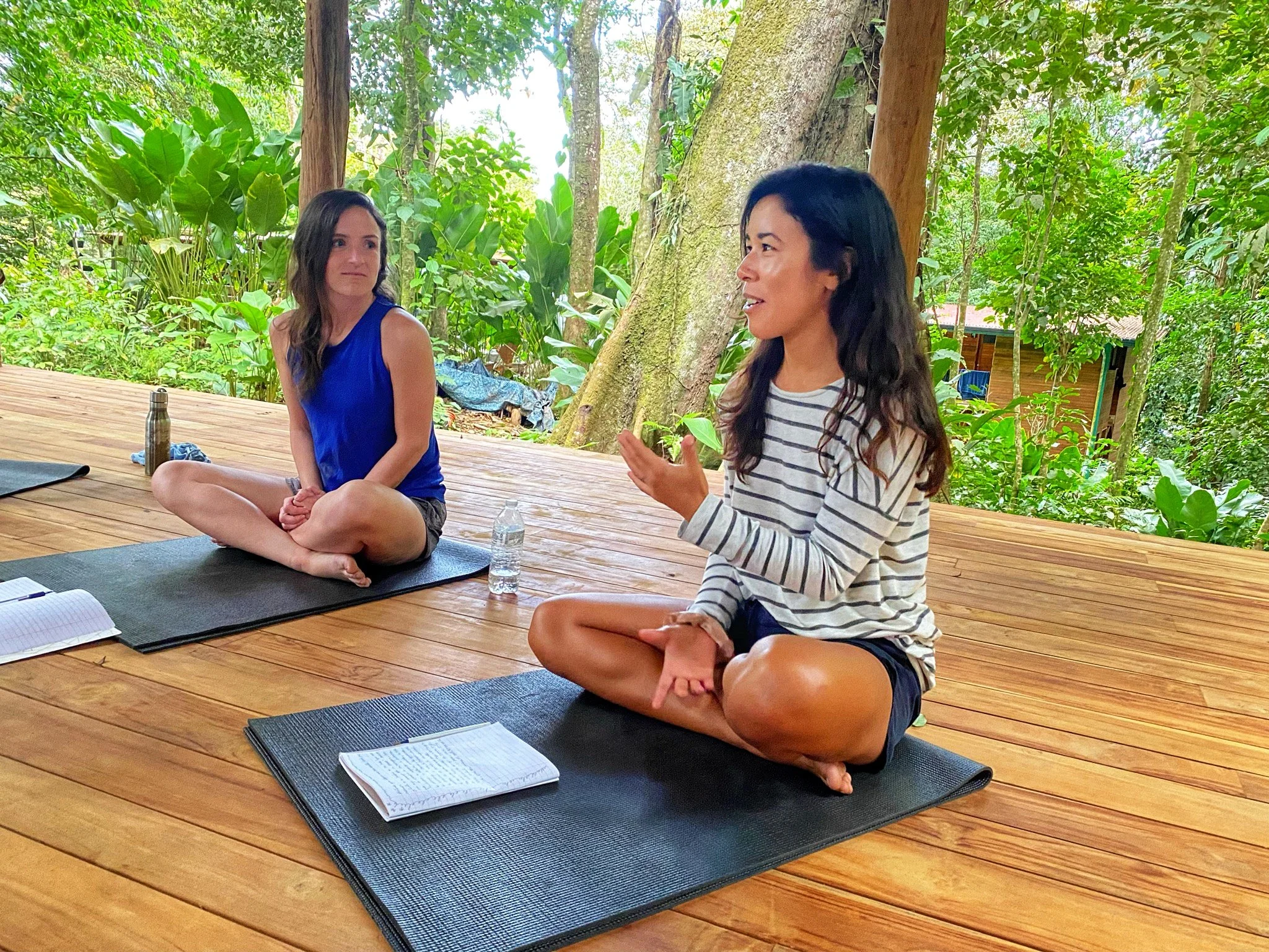 two on yoga mats.JPG