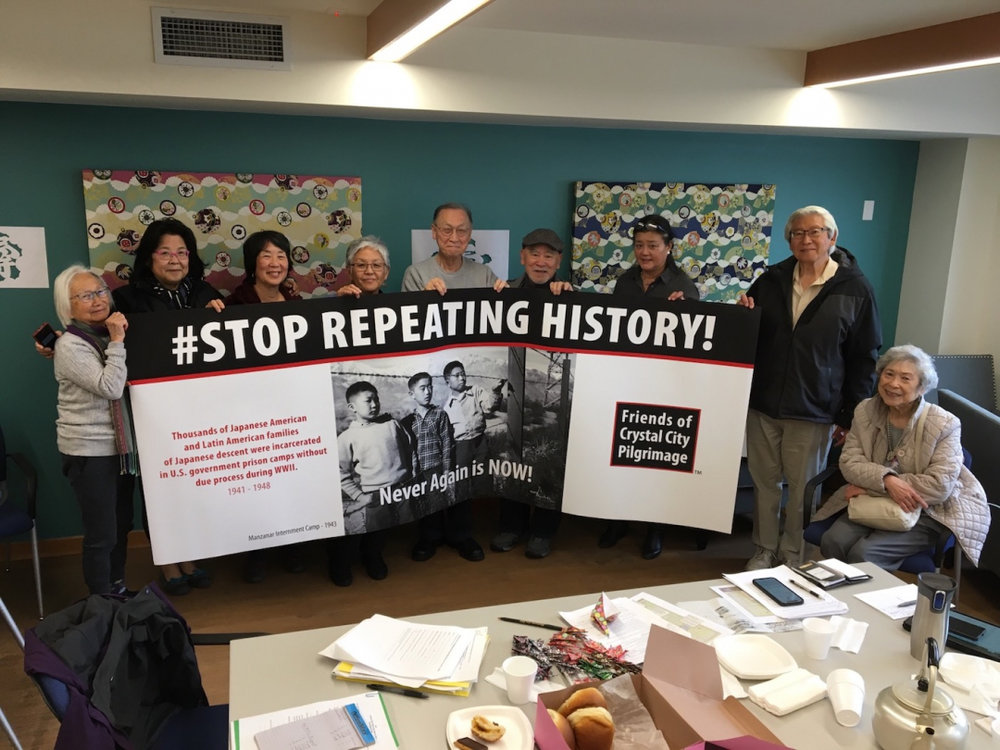   Crystal City Pilgrimage and Protest Committee with the banner for the protest that Kaz Naganuma designed (photo by Victor Uno)    