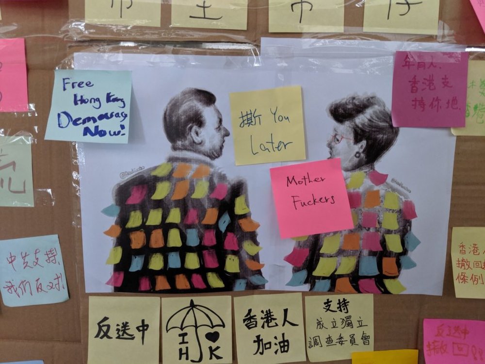  Illustration of Chinese president Xi Jinping and Hong Kong chief executive Carrie Lam covered with Post-Its by Badiucao ends up on one of the “Lennon walls” in Hong Kong. Courtesy of Badiucao. 