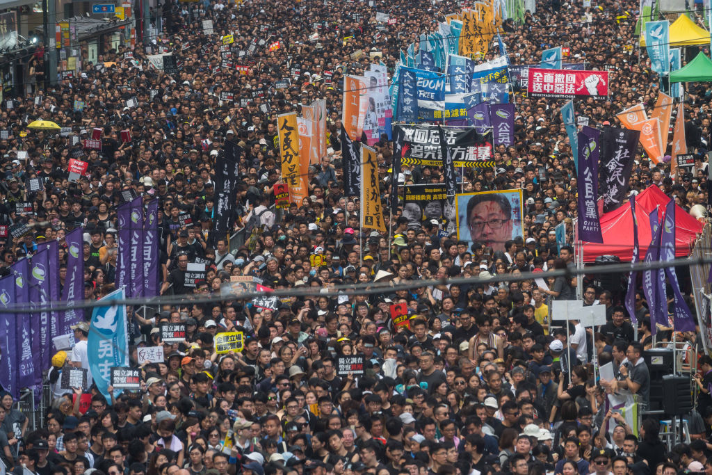  Protesters take part in a rally against extradition bill on July 1, 2019, in Hong Kong as riot police officers used batons and pepper spray to push back demonstrators. (Photo by Billy H.C. Kwok/Getty Images) 