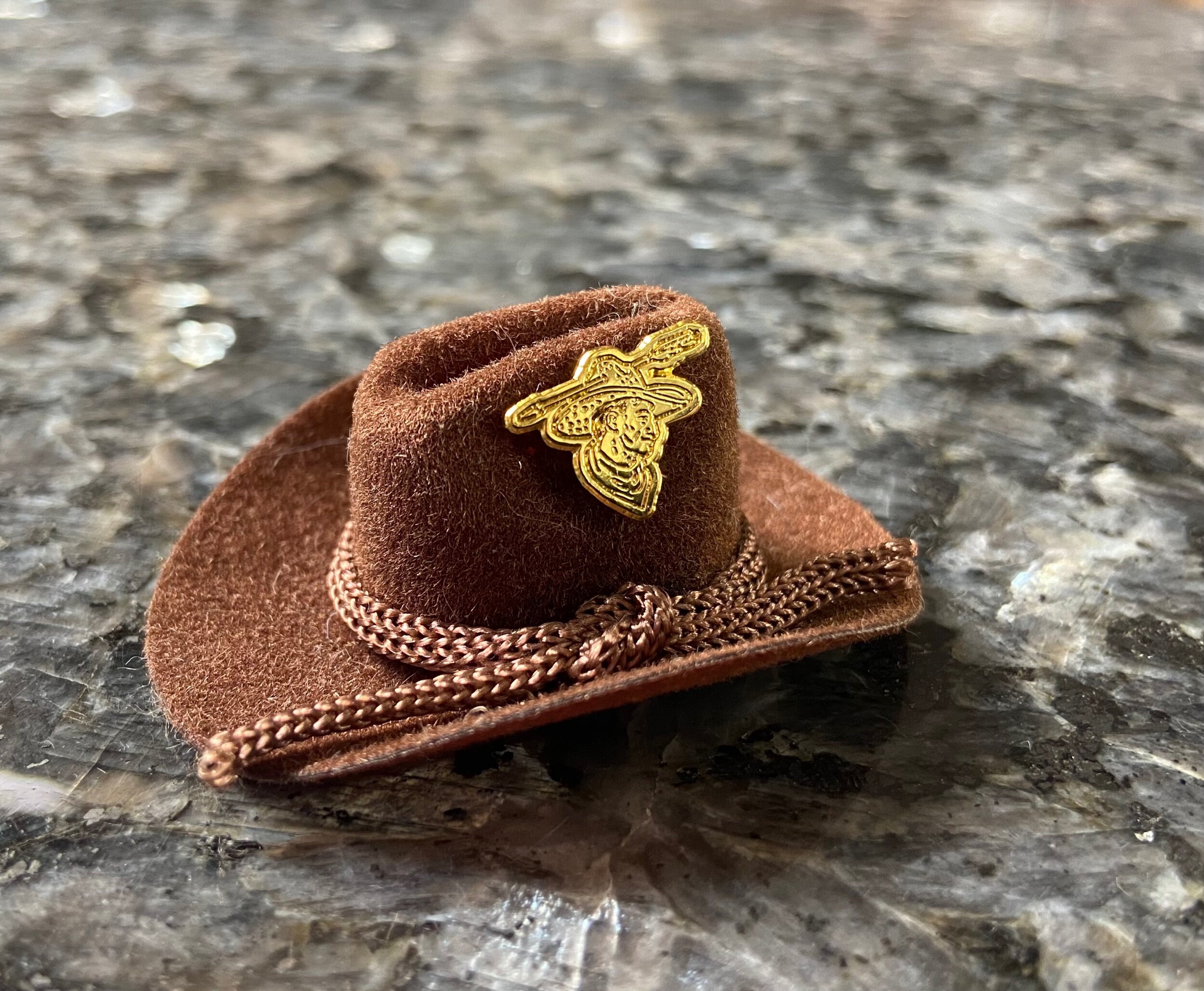 Cowboy logo pin — Bowman Hat Co.
