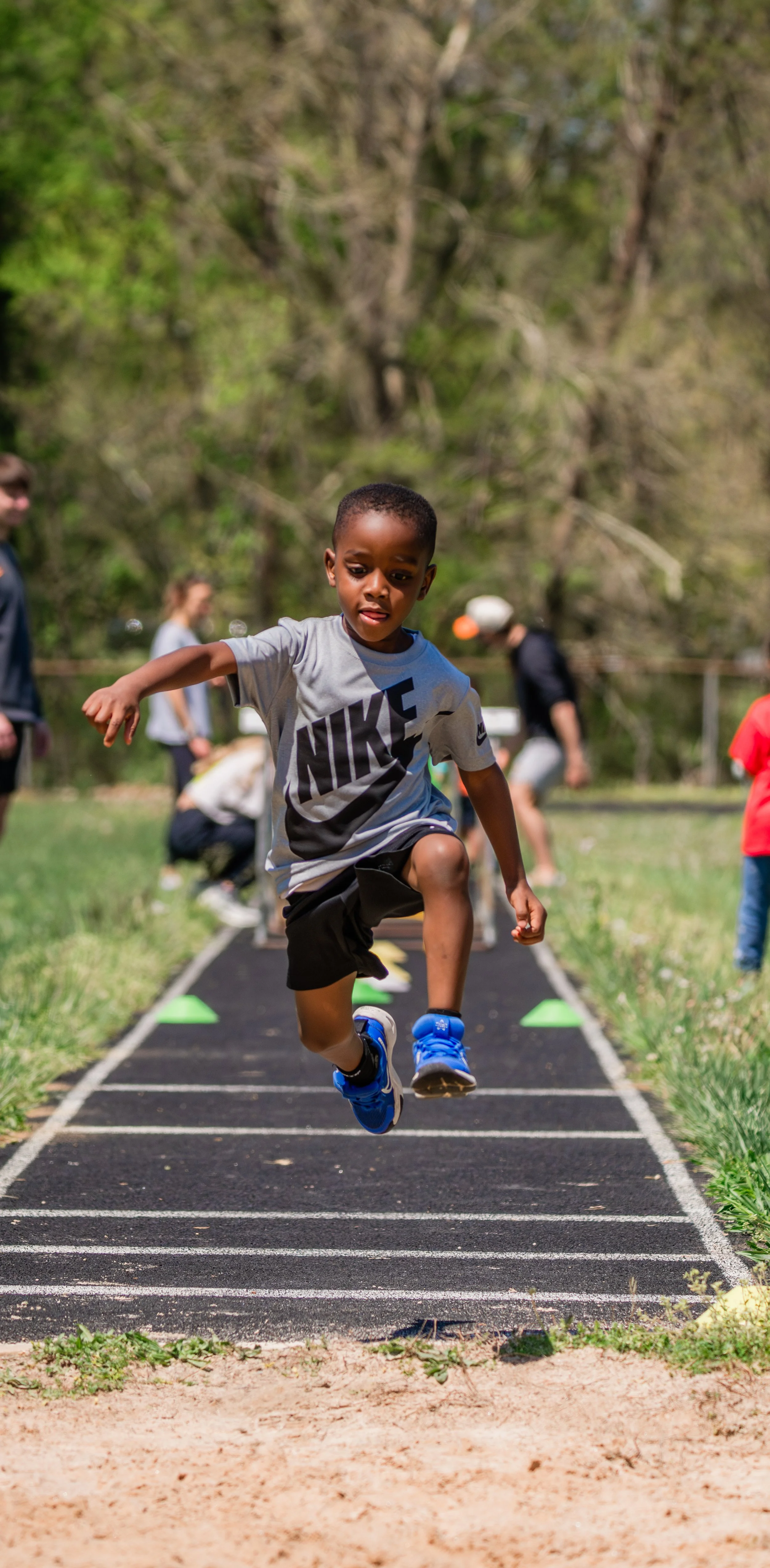 RYC_child-running-on-long-jump-runway_cropped.jpg