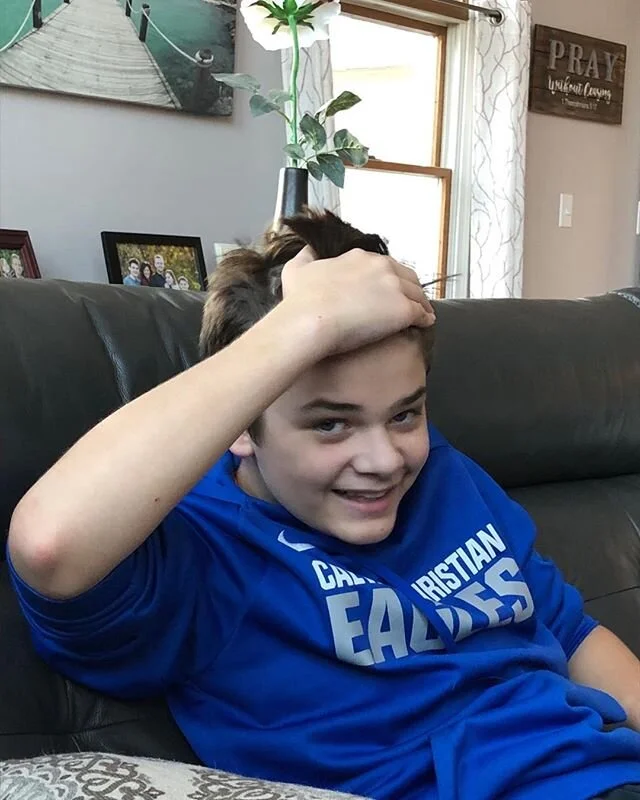 Jax and Vince have a bet going.  Whoever can put their hair in ponytail first gets $50. 🙄🤣. Who&rsquo;s in?!