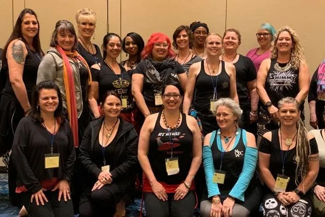 Lisa is surrounded by workshop participants at ATS Reunion