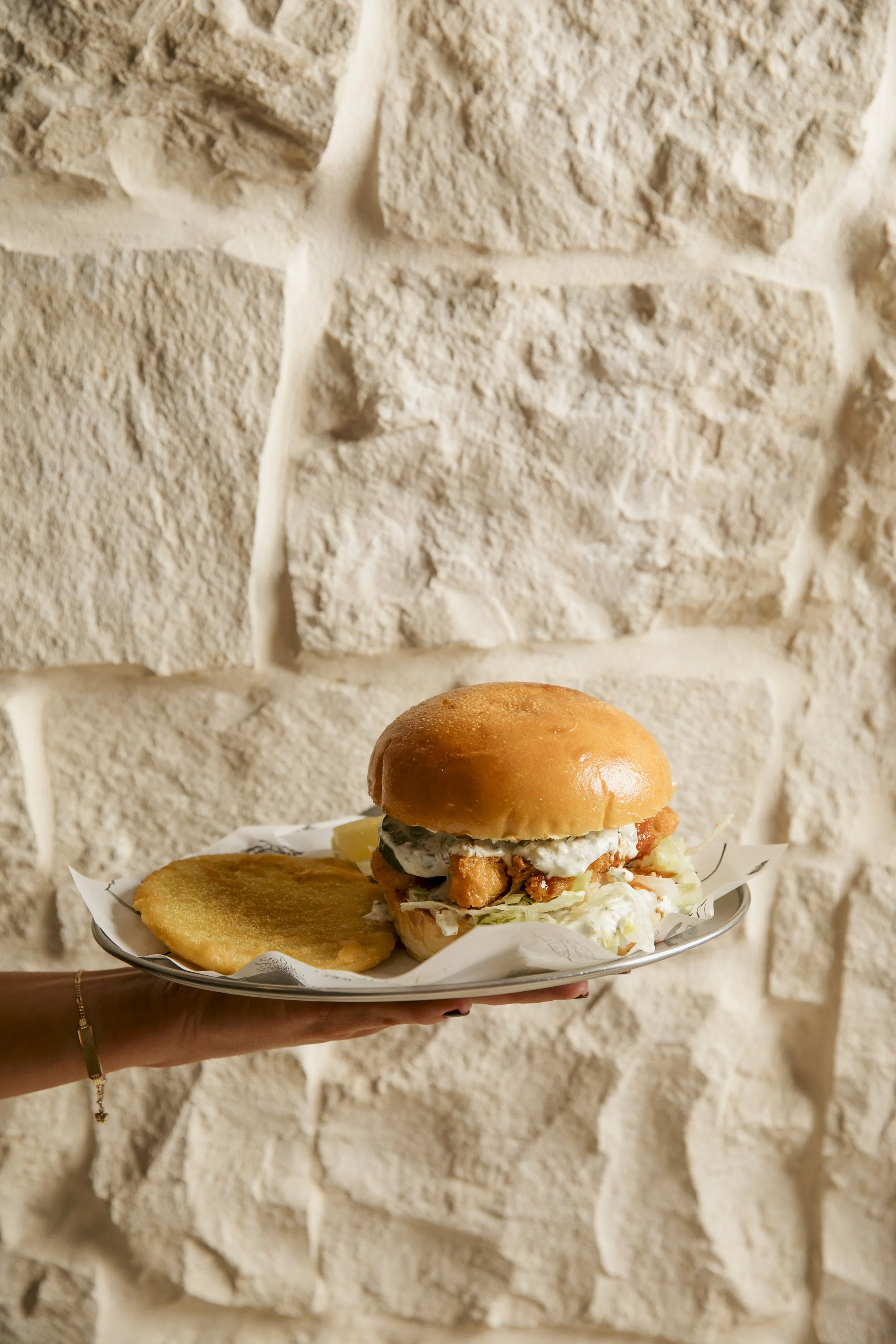  Fried Panko Prawn Bun w. Iceberg, Gribiche Sauce, Pickled Cucumber &amp; Potato Cake. 